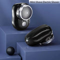Mini Shave Portable Electric Shaver for Men on a stylish surface, compact and sleek design for convenient grooming.