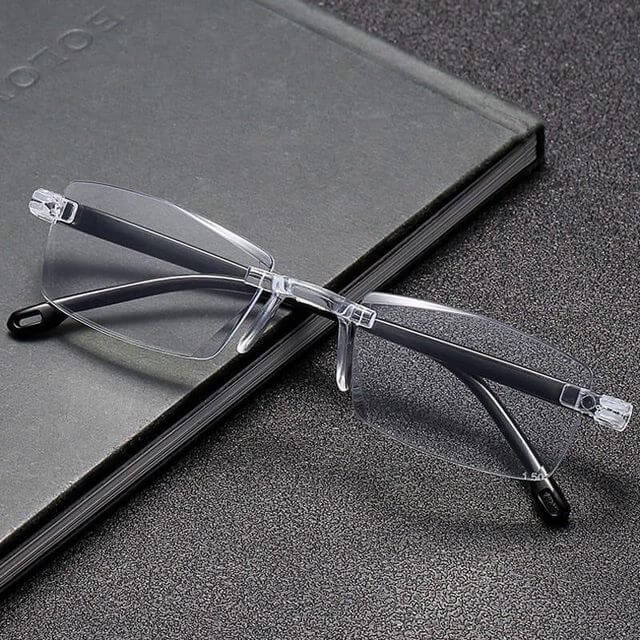 Daily use reading glasses pack of 2 on black notebook